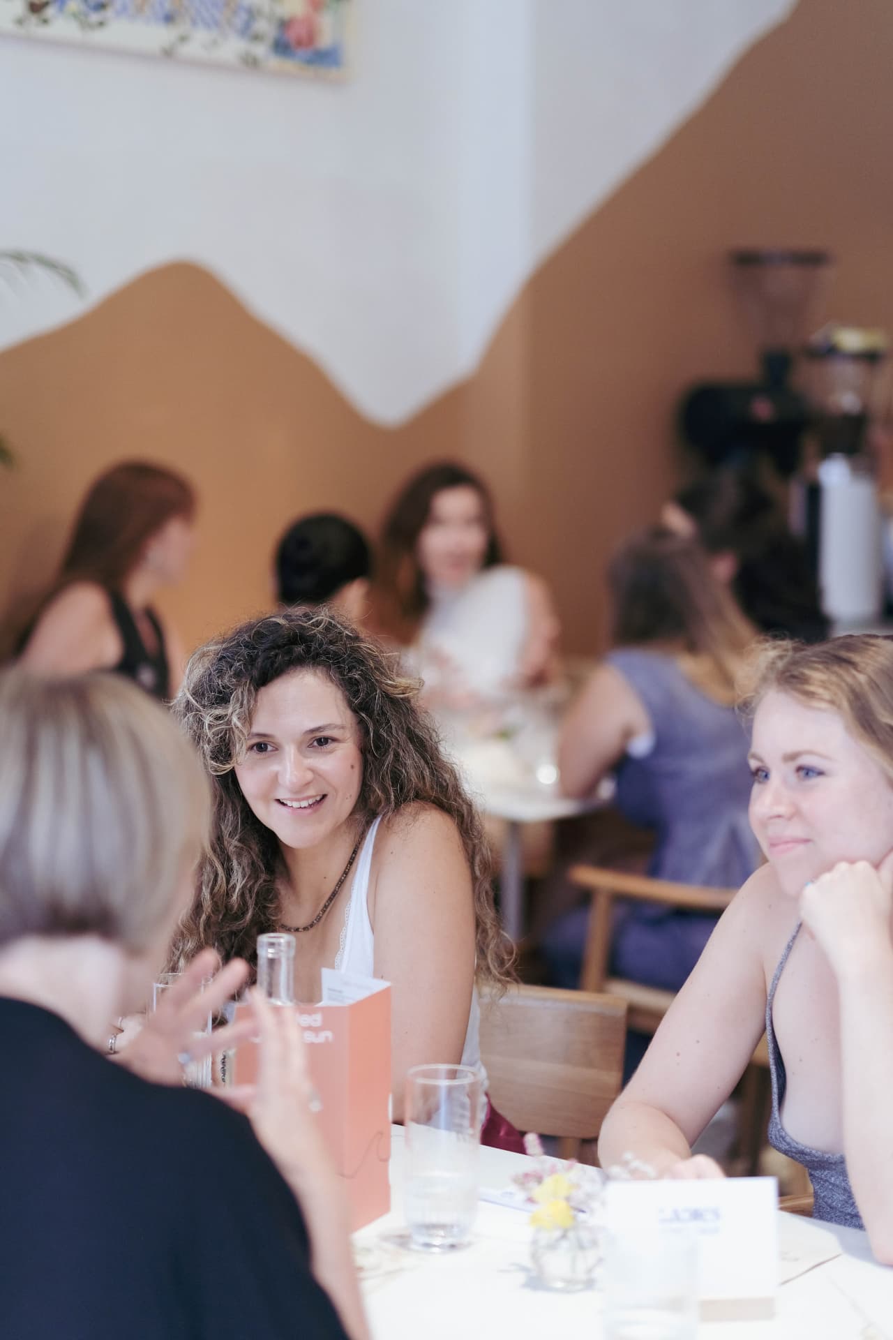 Members in conversation during a community brunch